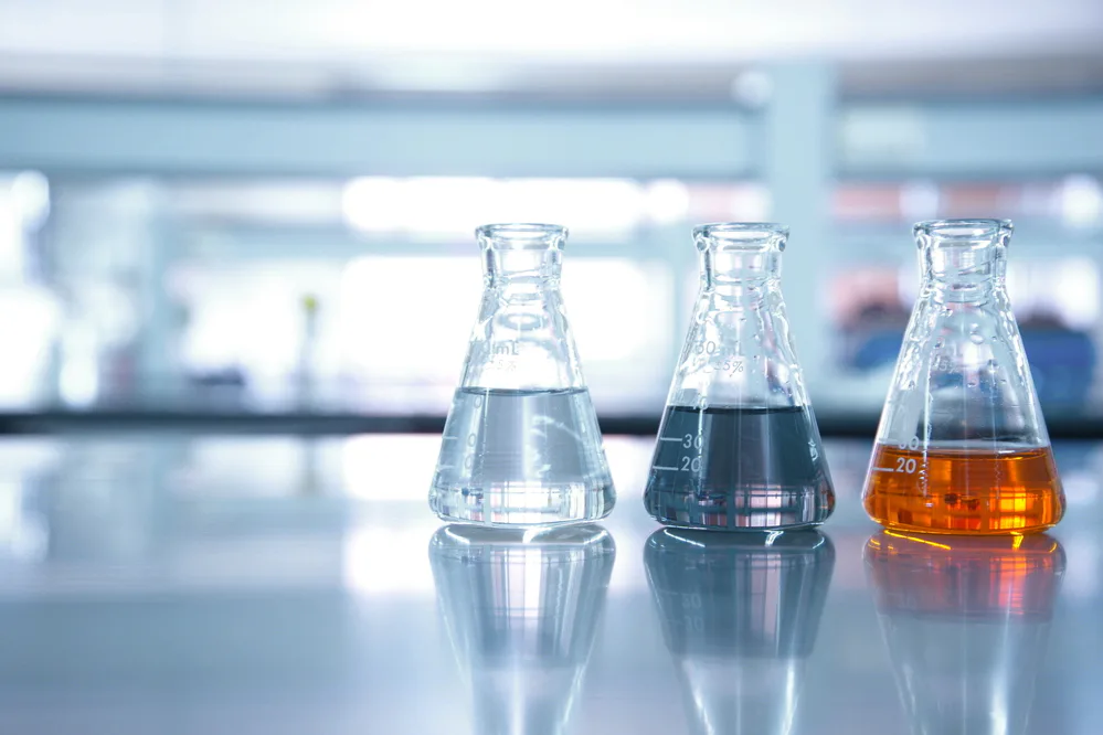 Three conical flasks Three conical flasks with different colored liquids